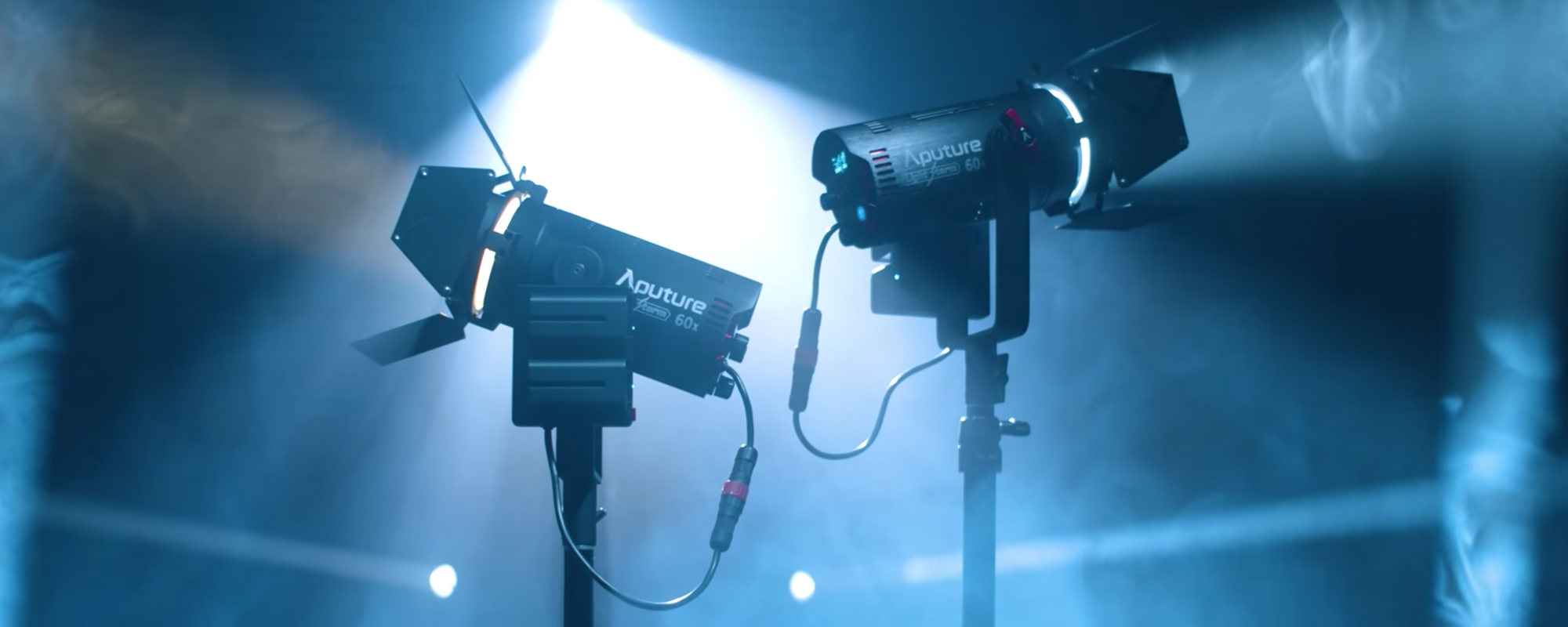 two Aputure Light Storm LS 60x LED lights shown from the side