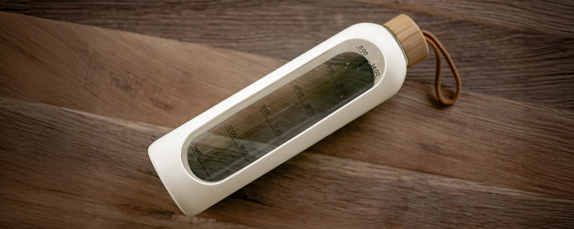 Butelka szklana KiCA Hydro Glass 1000 ml - biała leżąca na podłodze