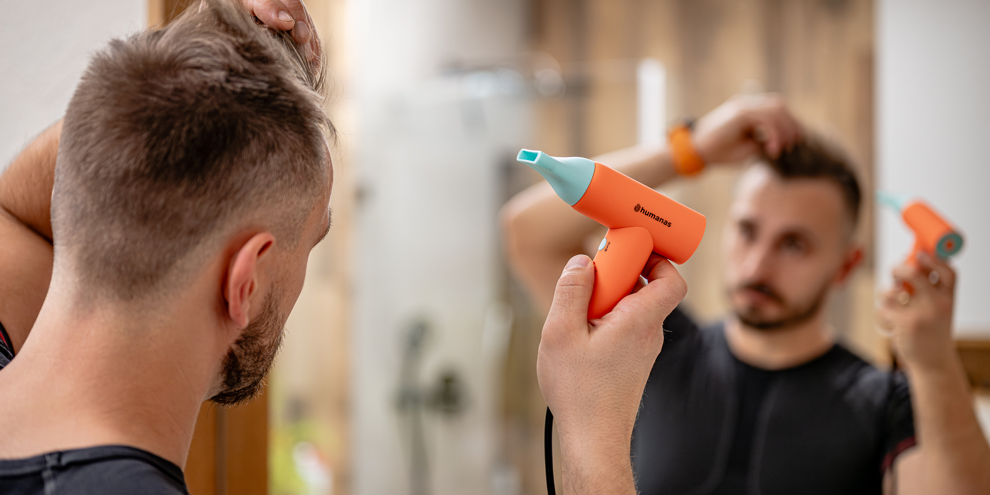 Suszarka do włosów z funkcją jonizowania Humanas AirTouch HD-AT03 mini - pomarańczowa