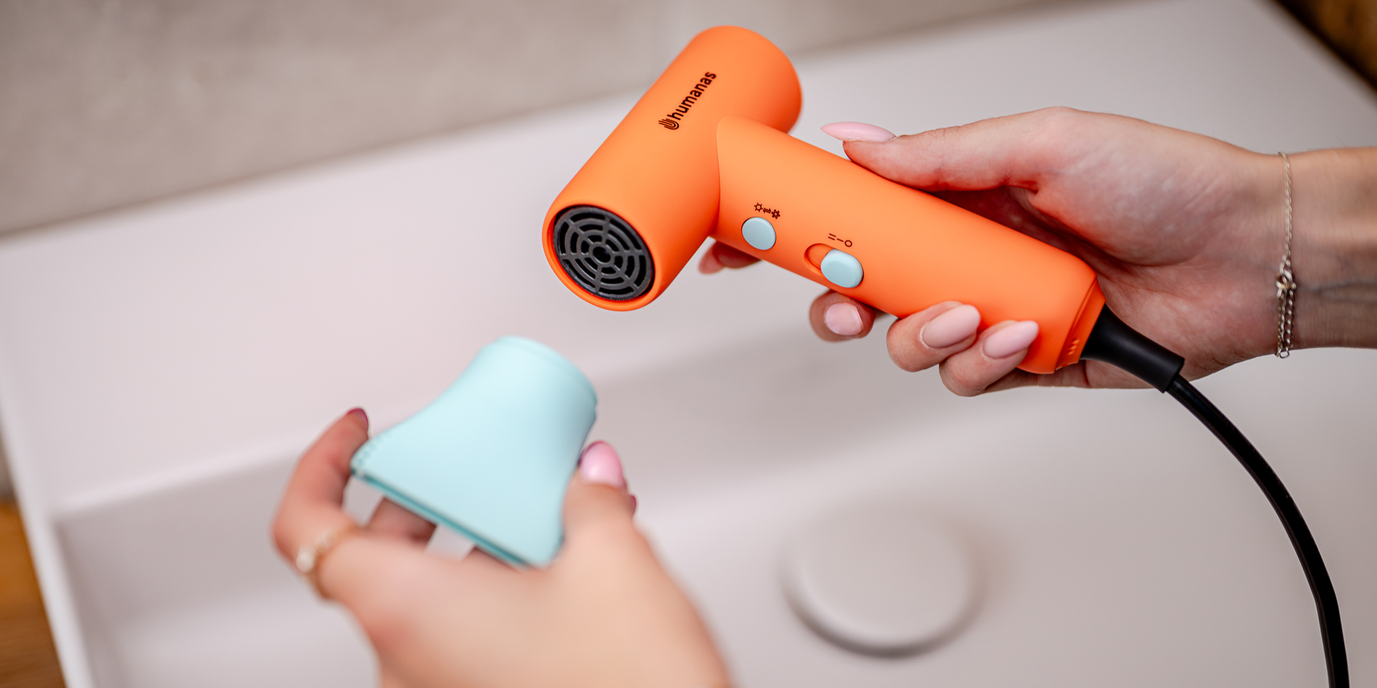 Suszarka do włosów z funkcją jonizowania Humanas AirTouch HD-AT03 mini - pomarańczowa