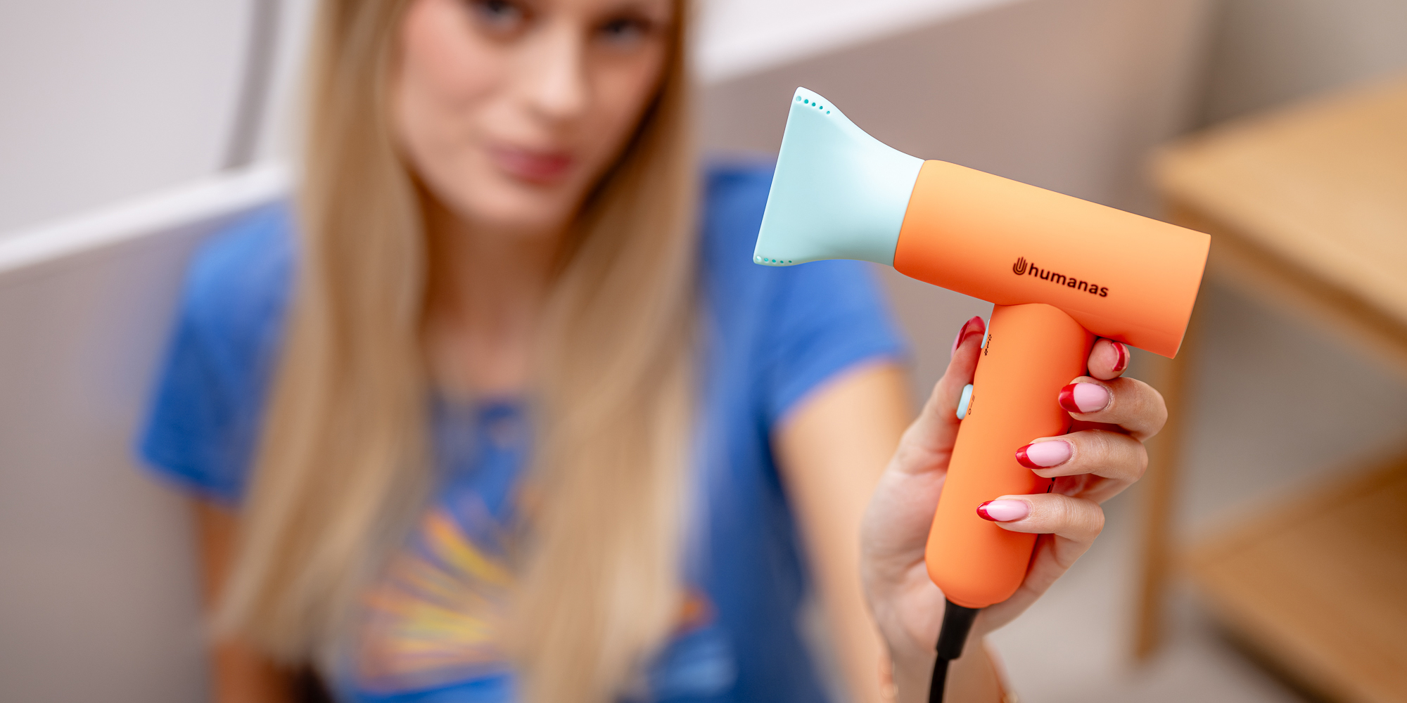 Suszarka do włosów z funkcją jonizowania Humanas AirTouch HD-AT03 mini - pomarańczowa