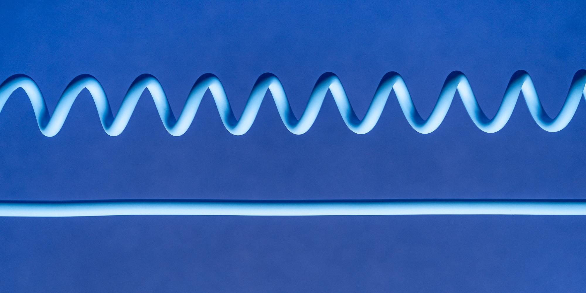 Kabel Newell USB-C - USB-C 100 W, 1,5 m, silikonowy, spiralny, niebiesko-pomarańczowy