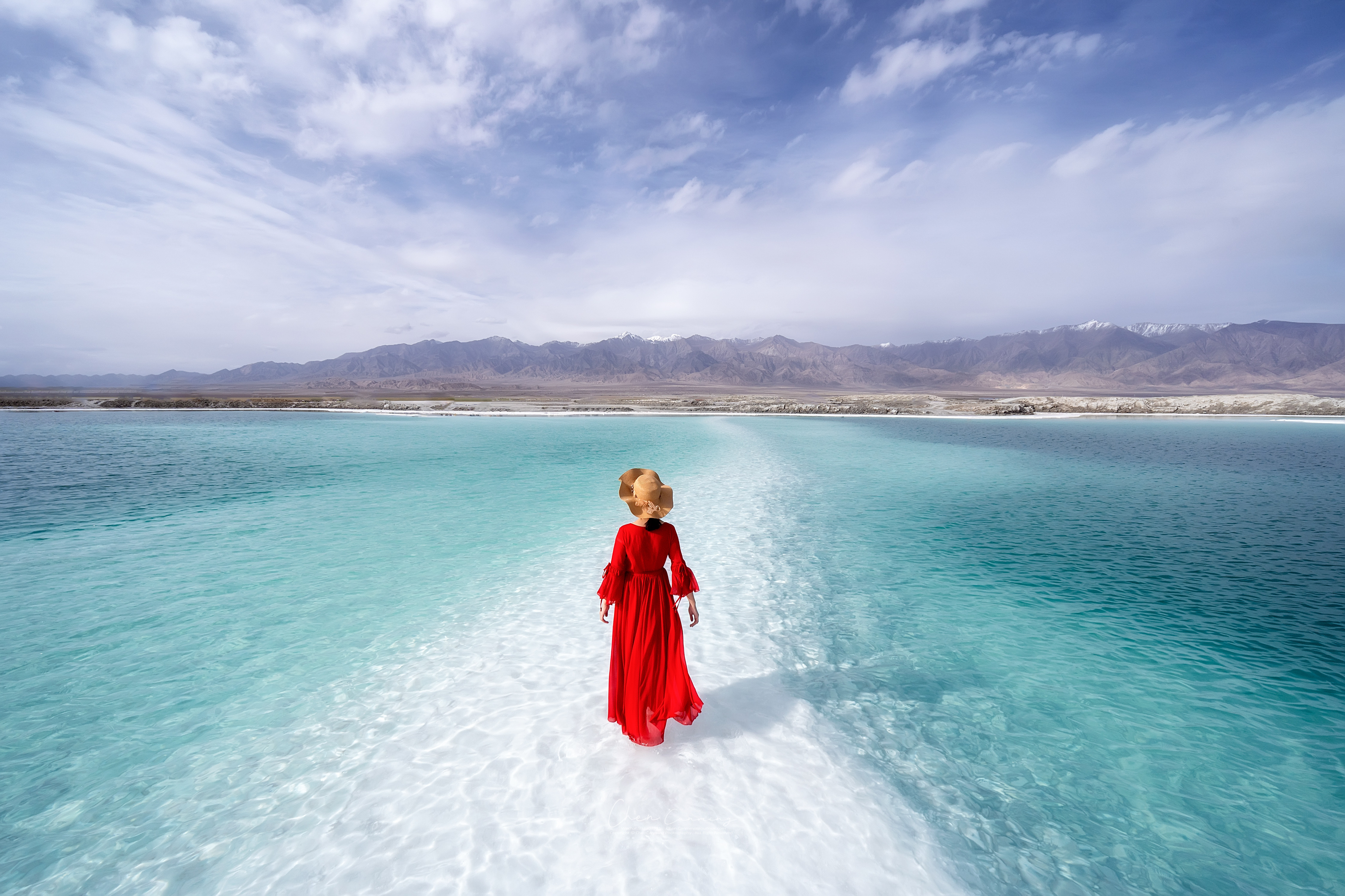 [Photo of a woman on the waterfront]