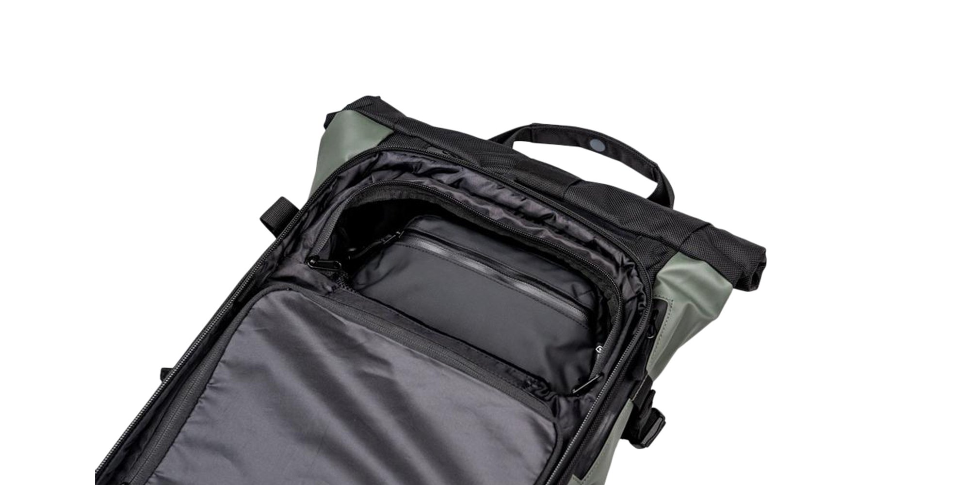 Wandrd Tech Pouch Large in the top compartment of the Prvke backpack